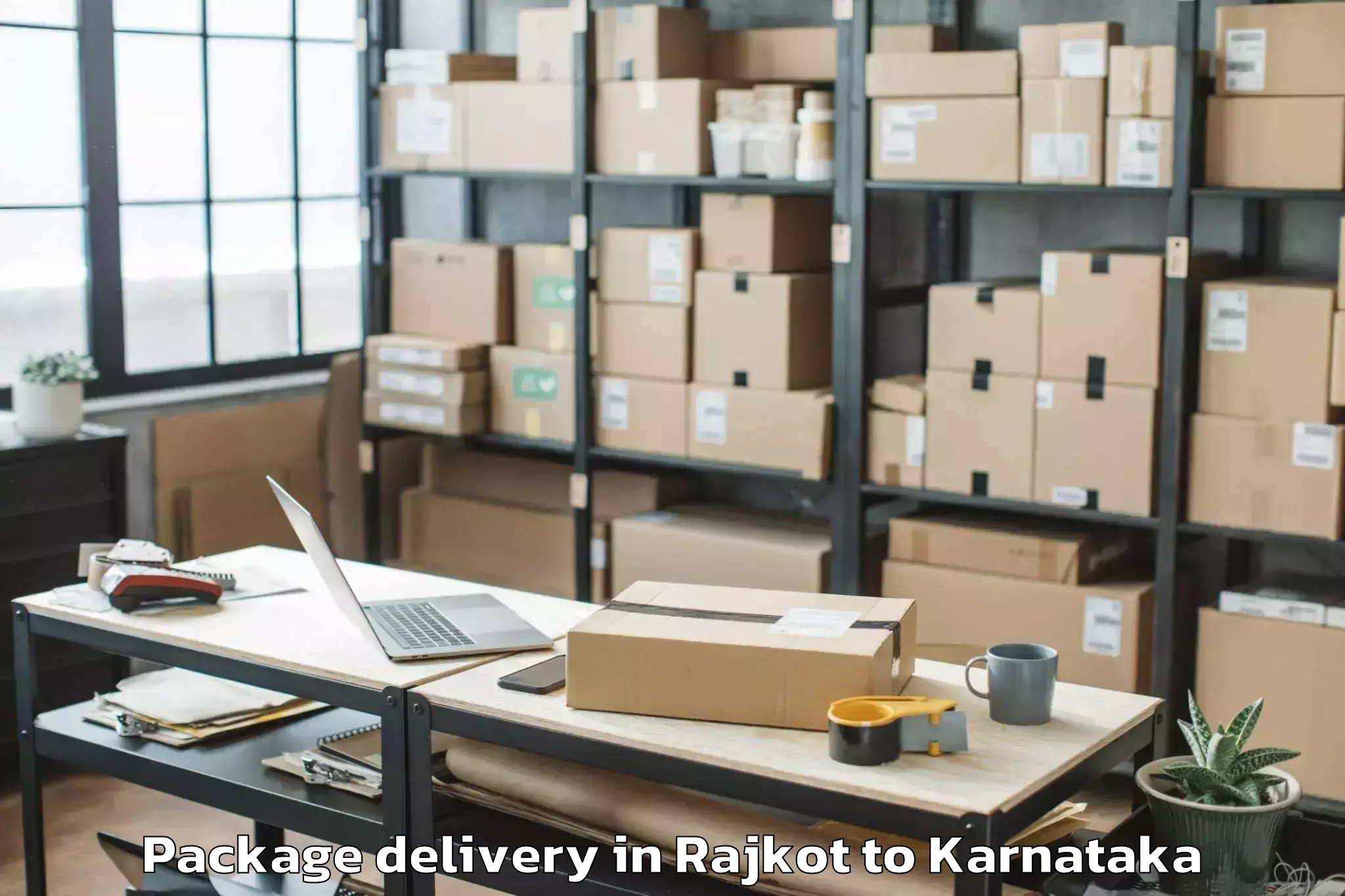 Top Rajkot to Davangere University Davangere Package Delivery Available